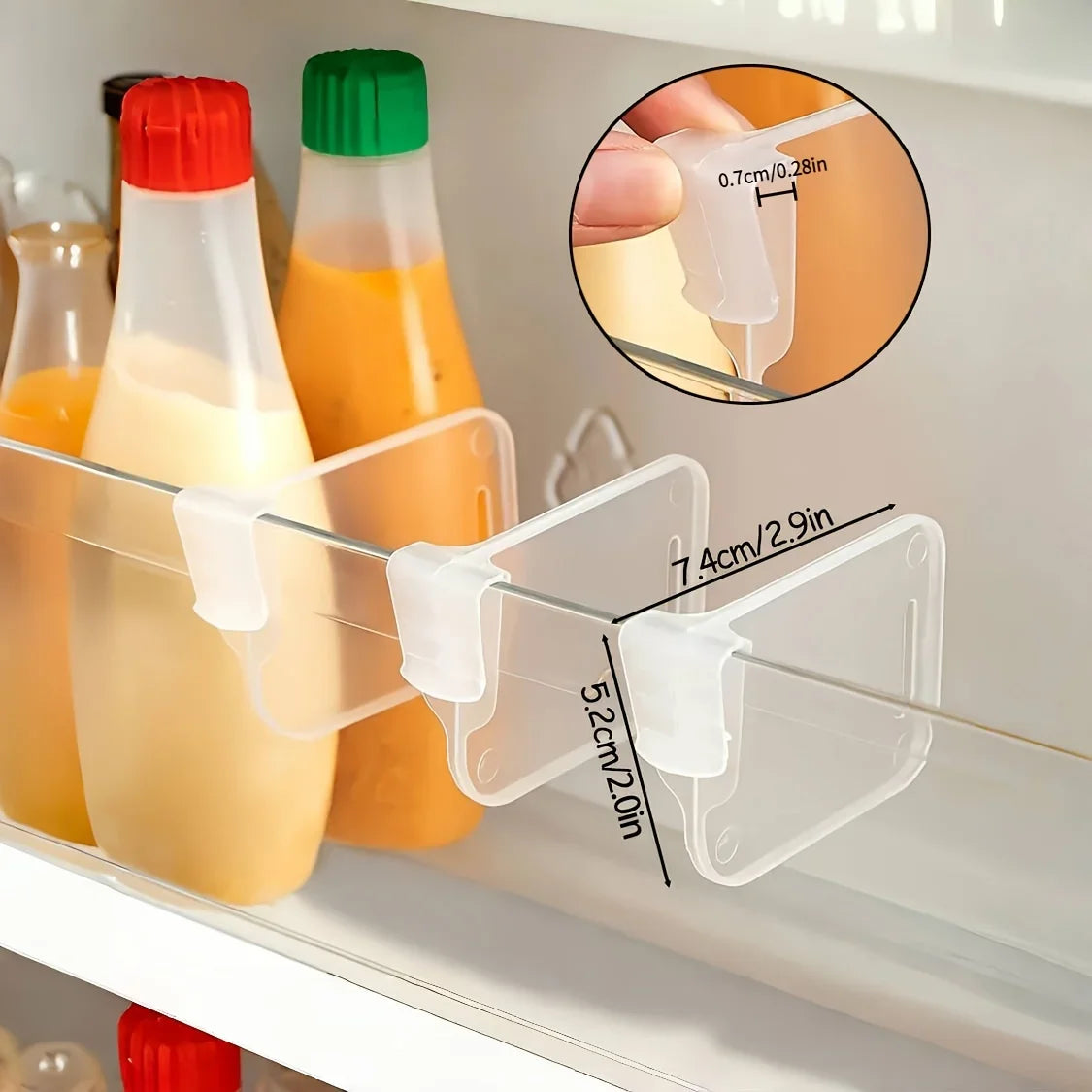 NestNook clear fridge shelf dividers separating bottles and jars in refrigerator